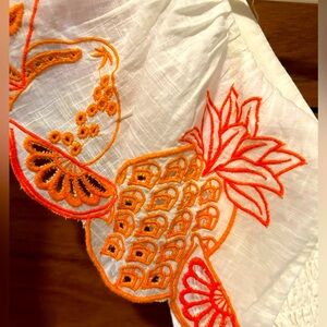 Linen, square neck fluttery mini dress. Anthropologie